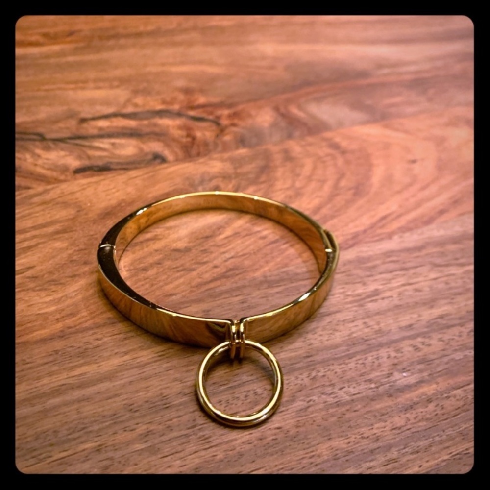 Alexis Bittar Gold Hinged Cuff Bracelet with circle detail. NWOT